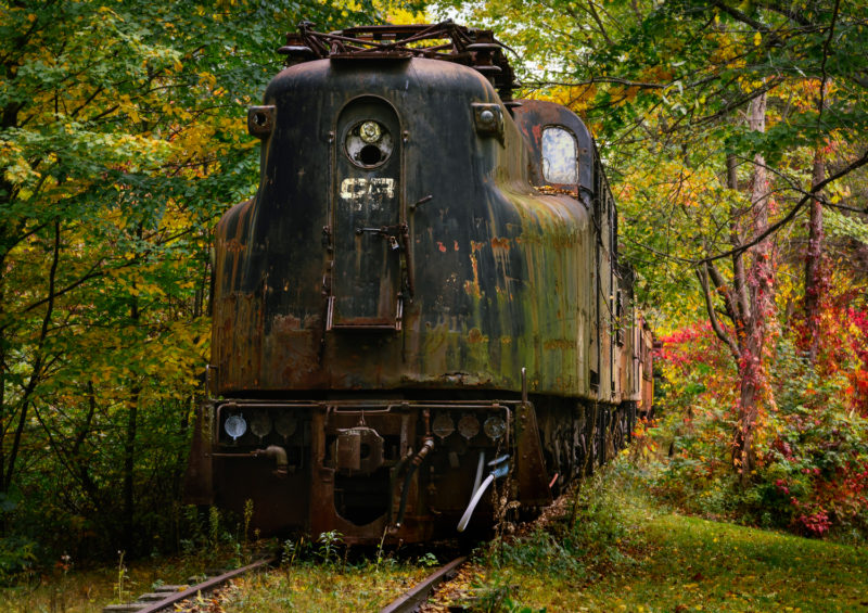 Abandoned train sits on a New York track.