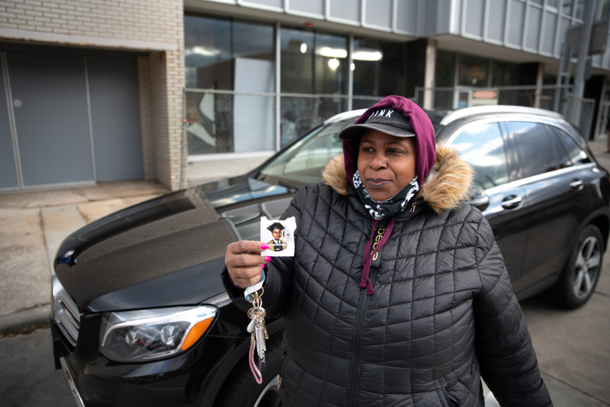 Tamir Rice' mother, Samaria Rice, looks on after early voting in the General Election in Cleveland, Ohio on November 2, 2020. Rice holds a sticker of her son Tamir, who was killed by Cleveland Police in 2012. The 2020 General Election would've been the first election Tamir could have voted in.