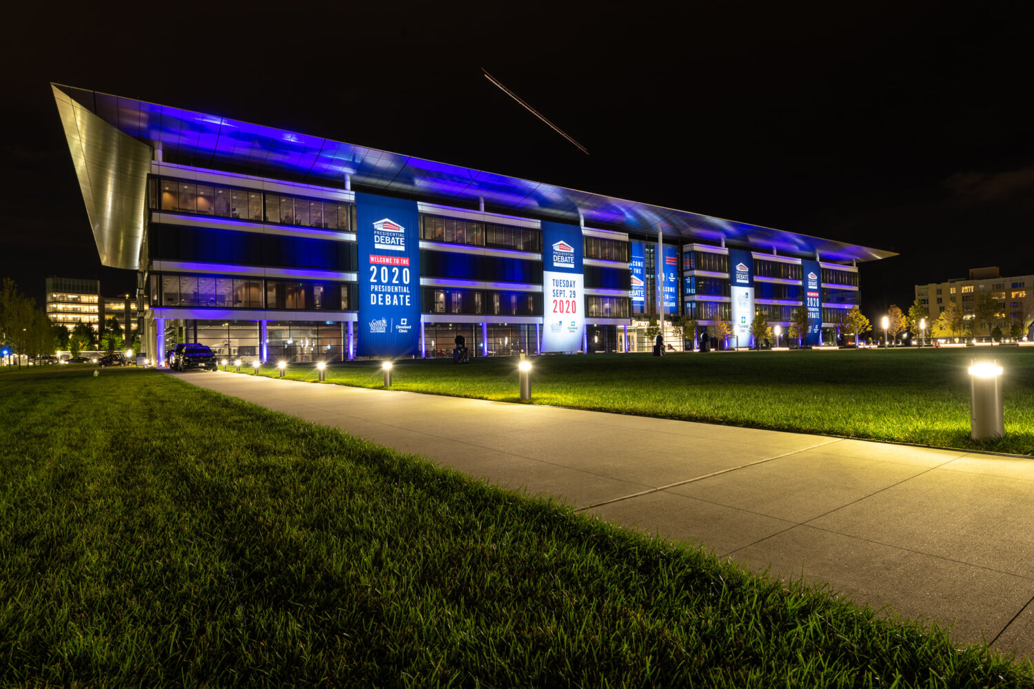 A helicopter flies overhead of the Samson Pavilion, the location of the first presidential debate.